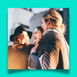 image of three women talking together and laughing